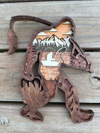 Sasquatchin detail: forest and fishing scene texture showing laser-cut intricacy
