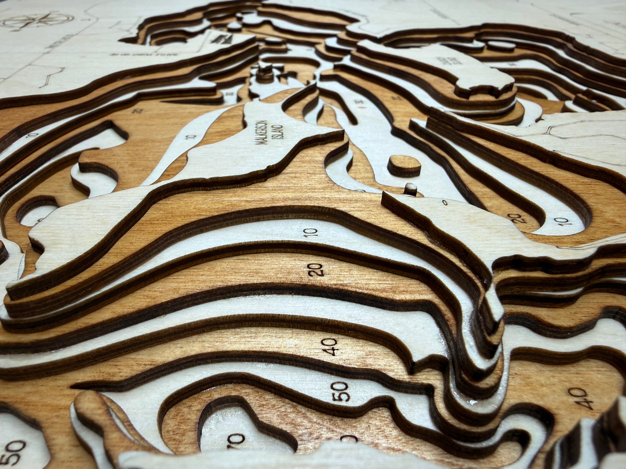 Bay Lake detail: precision cuts revealing depth transition