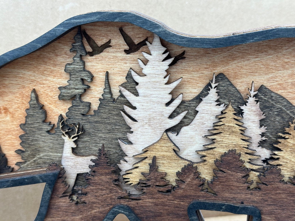Bear and Company detail: intricate laser cuts reveal layered depth across premium Baltic Birch