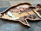 Crappie detail: dimensional cuts revealing the intricate layering of Baltic Birch