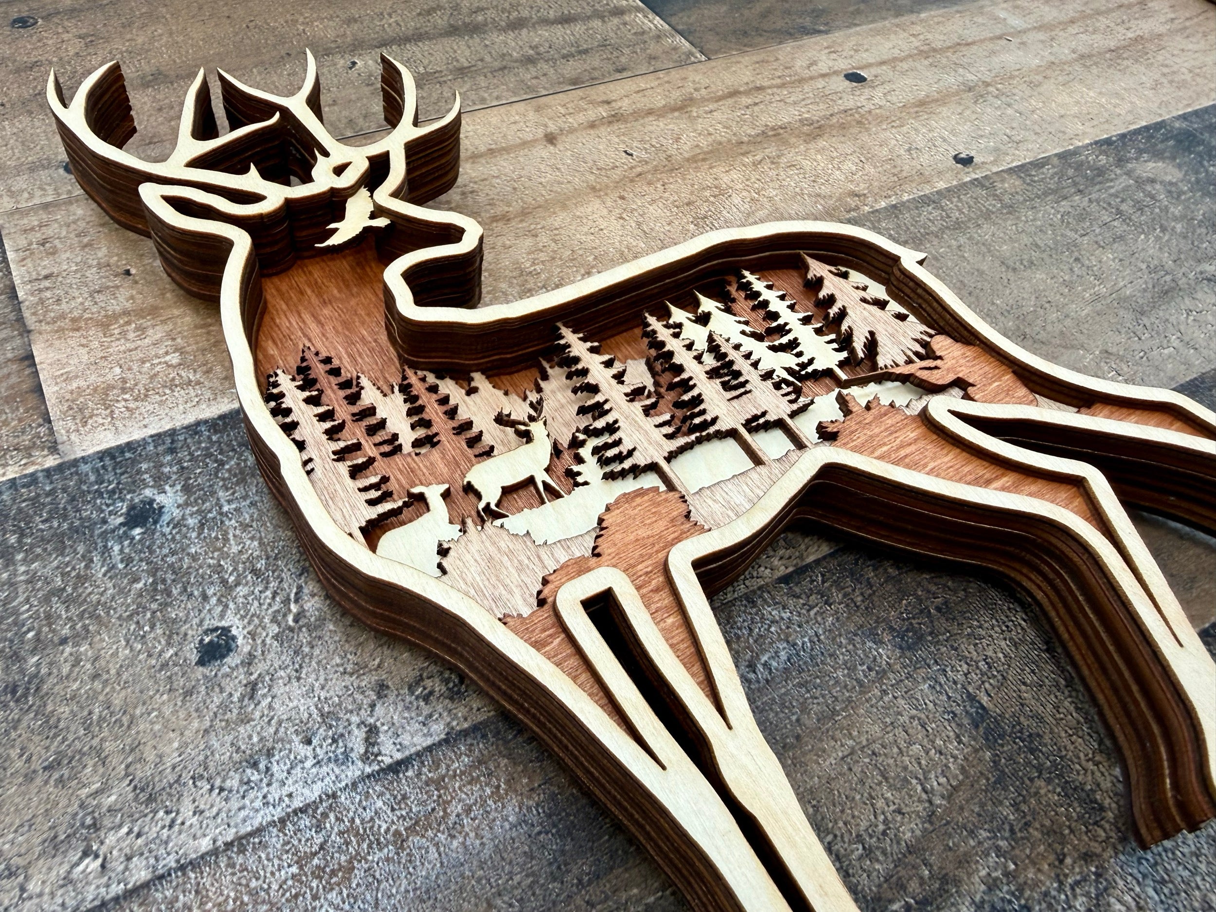 Deer in the Woods detail: close-up of fine laser cuts in premium Baltic Birch