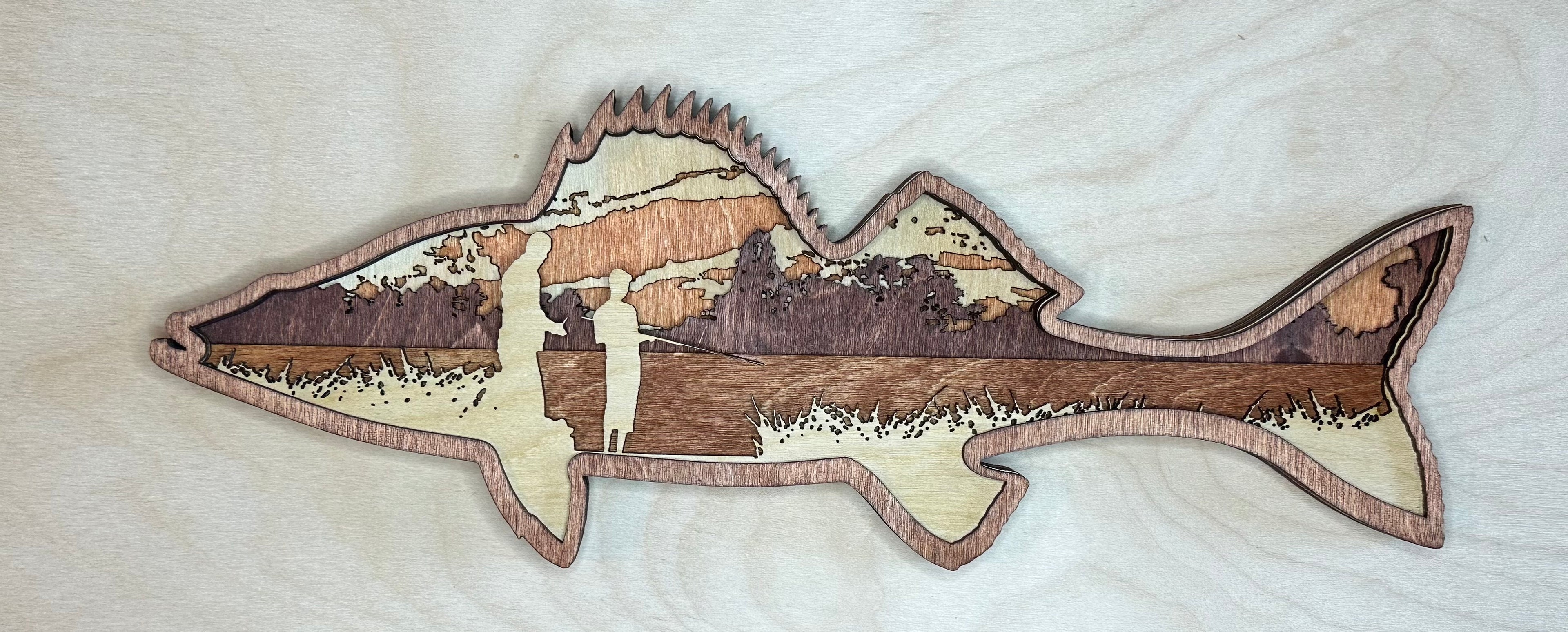 Walleye detail: fishing scene texture showing laser-cut precision