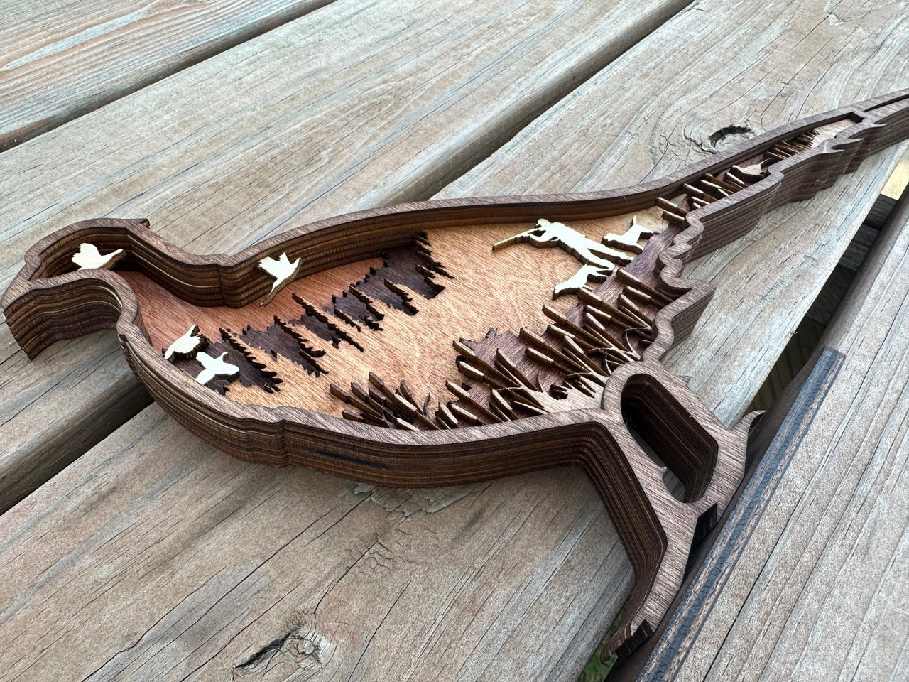 Pheasant Present detail: layered wood showing dimensional craftsmanship