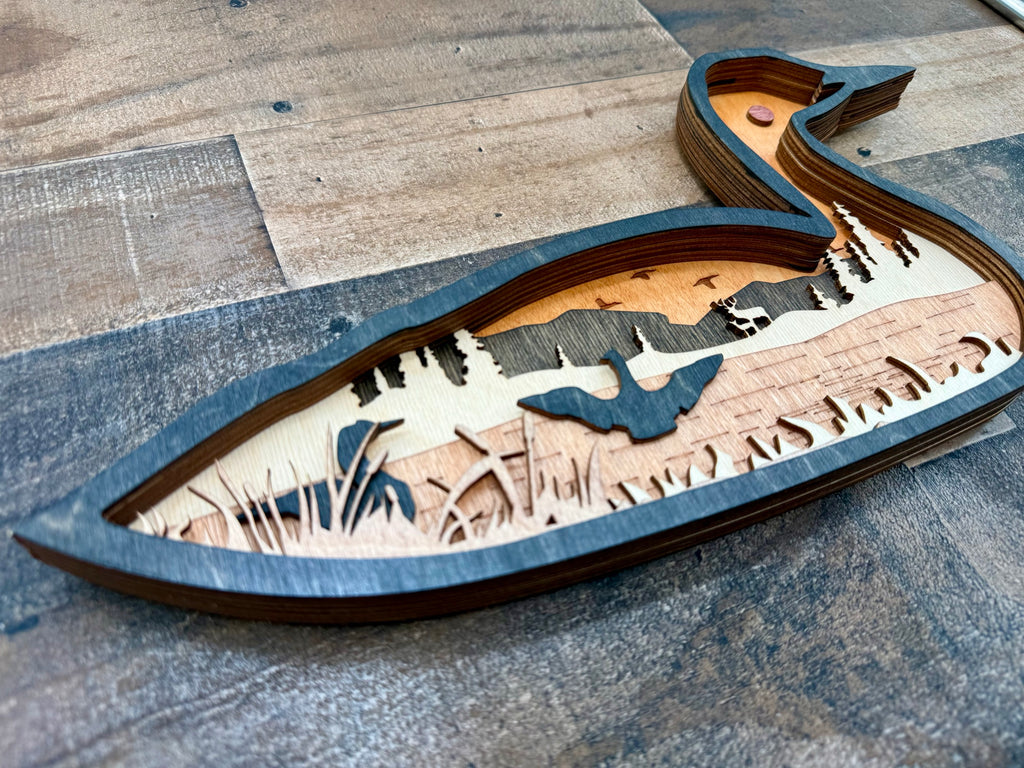 Loon detail: close-up of precision laser cuts in Baltic Birch layers