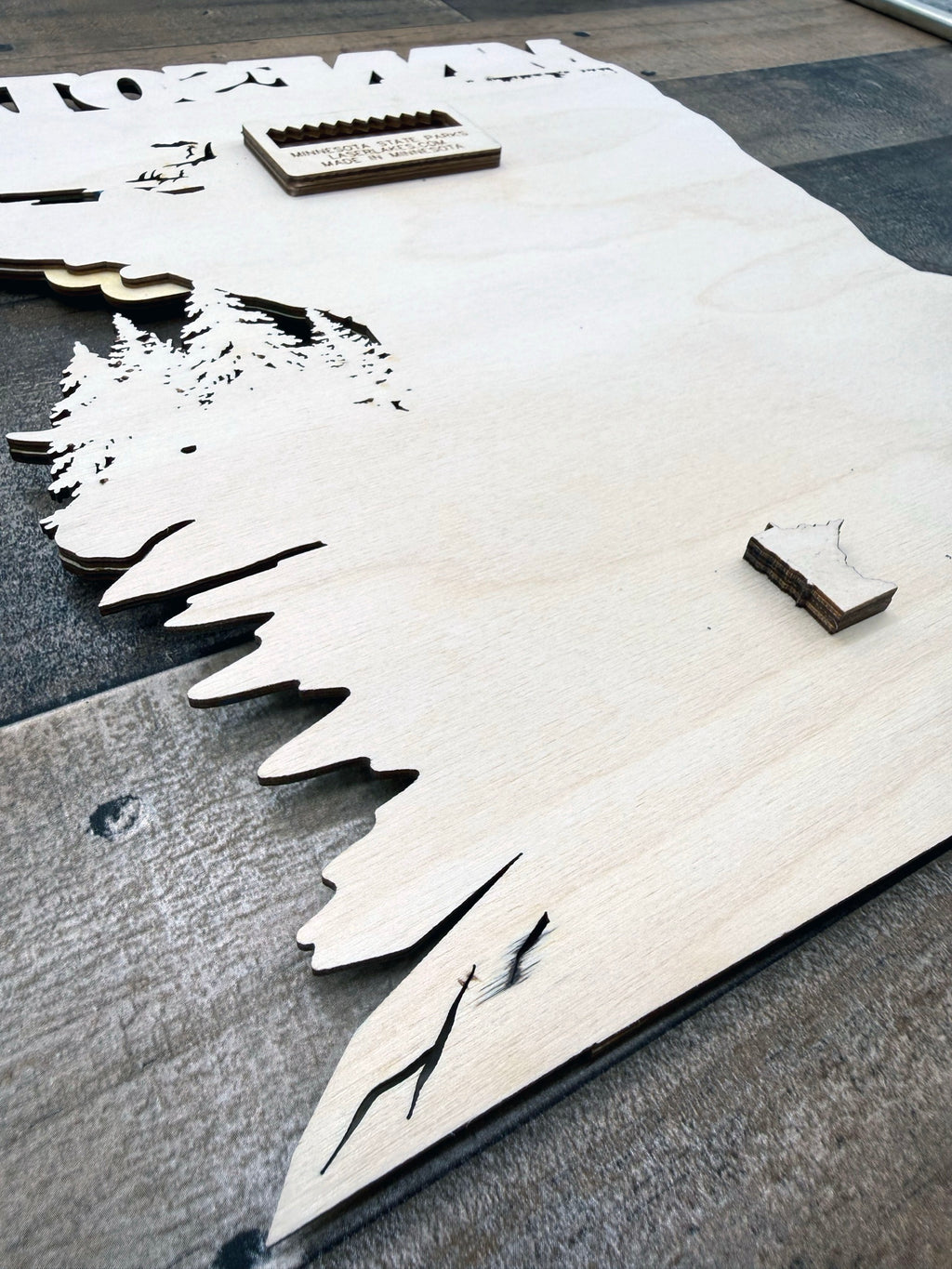 Minnesota State Parks Map detail view of laser-cut wood topographic design