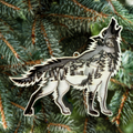 Wolf howling among the trees – symbol of mystery and wilderness ornament by Laser Lakes