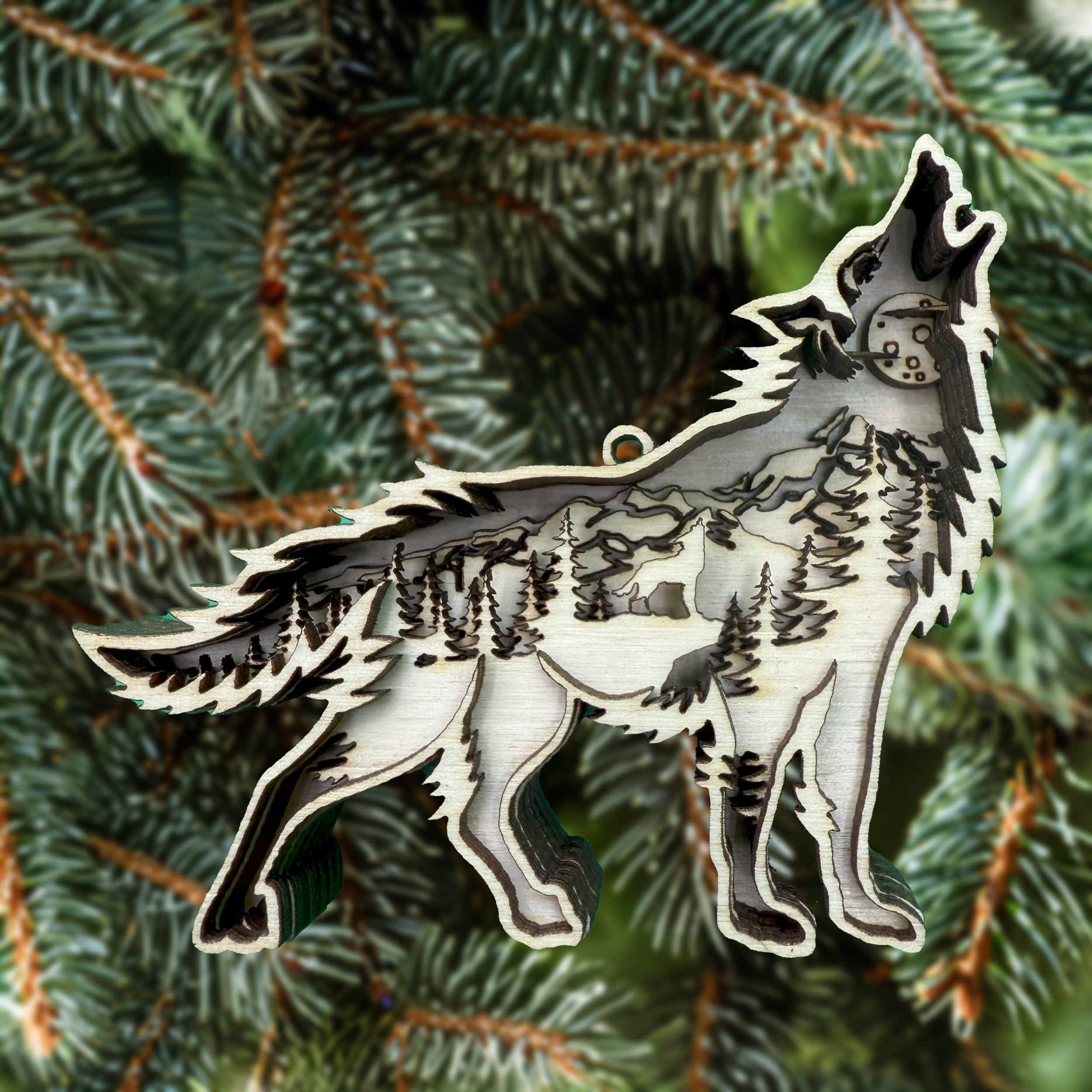 Wolf howling among the trees – symbol of mystery and wilderness ornament by Laser Lakes