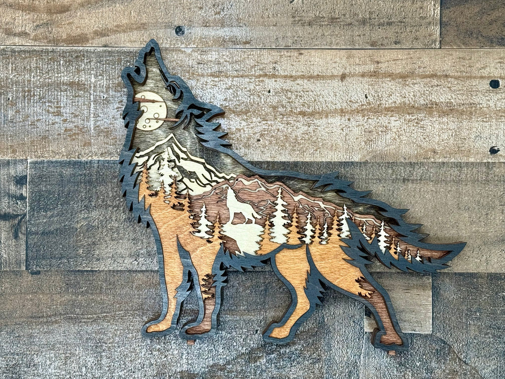 Wolf Song Dark laser-cut wood light sculpture with layered Baltic Birch and engraved wolf design
