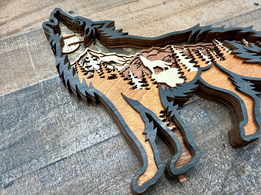 Wolf Song Dark dark wood laser-engraved light sculpture with layered relief wolf art