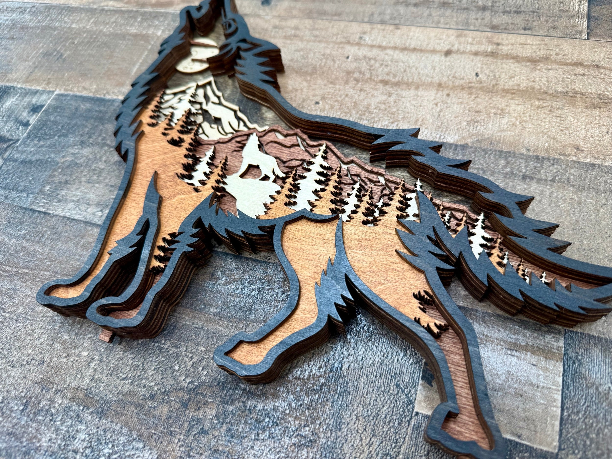 Wolf Song Dark 3D wood light with laser-cut wolf design and illuminated depth layers